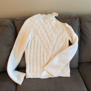 Cream sweater with one cold shoulder